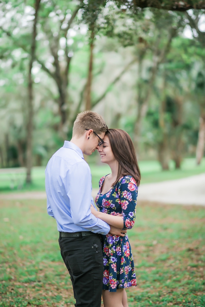 engagement picture of a couple in the park